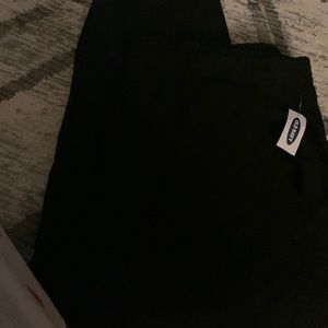 A pair of black old navy sweat pants